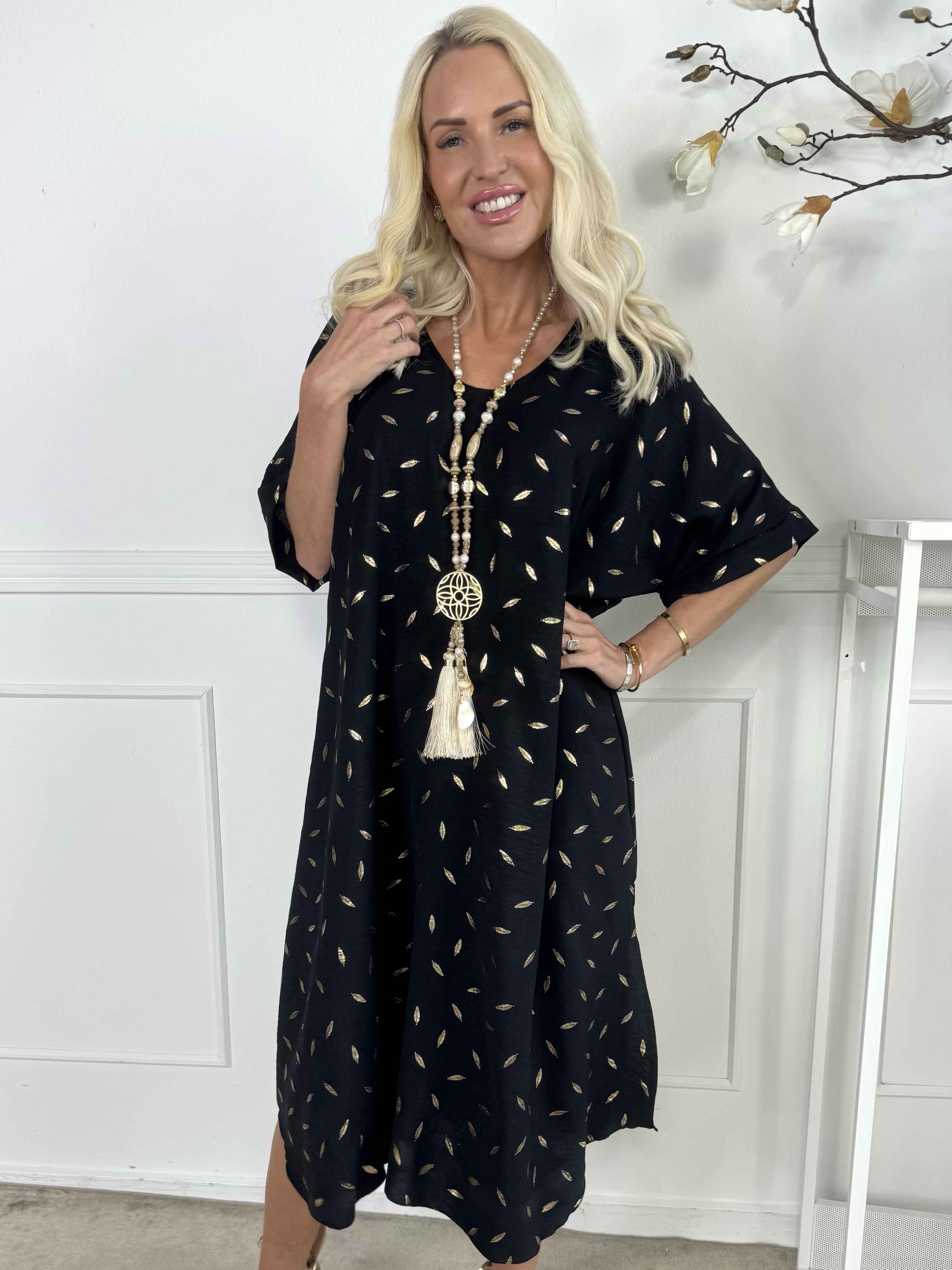 Valentina - Söt klänning med fina guldblad som detaljer